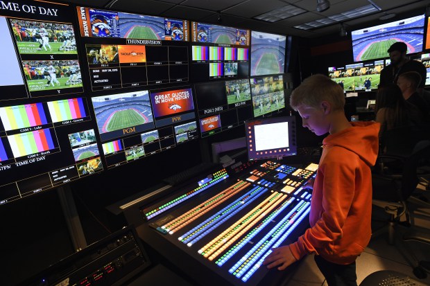 STEM students from Montrose visit the Denver Broncos Thundervision Control Center at Sports Authority Field at Mile High in Denver, Colorado.